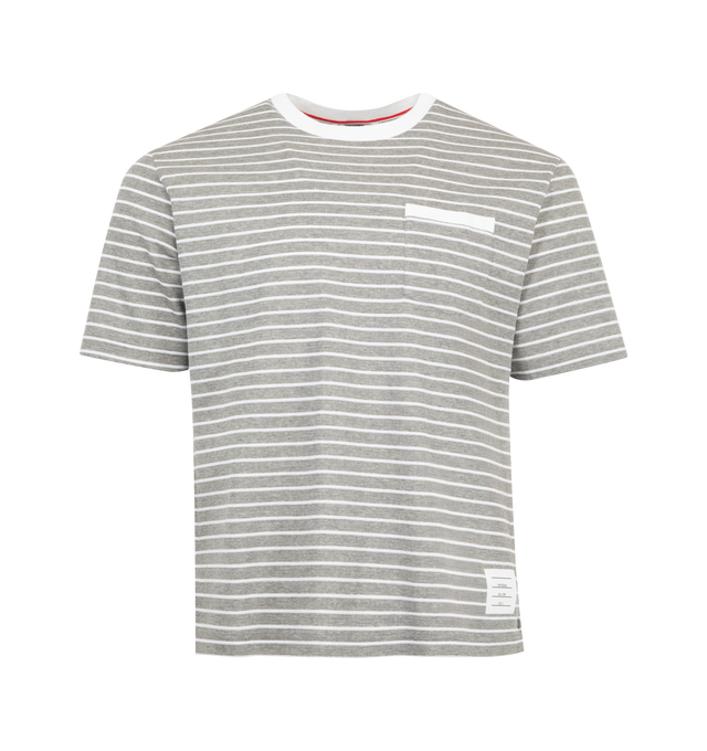 Image 1 of 2 - GREY - THOM BROWNE Milano Pocket Tee featuring chest patch pocket, short sleeves, crewneck, stripes throughout, name tag applique, buttoned side vents with signature striped grosgrain trim, dropped back hem and signature striped grosgrain loop tab. 100% cotton. Made in Italy.