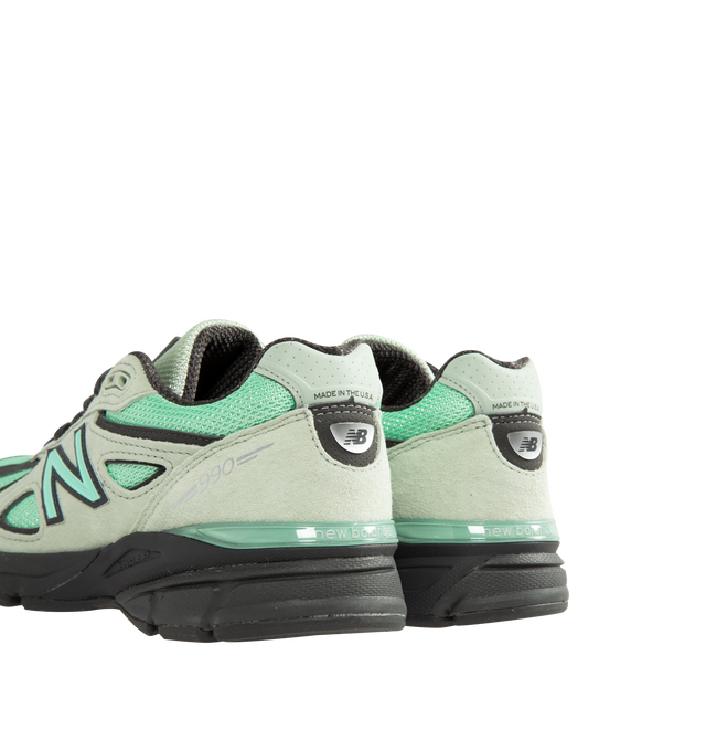 Image 3 of 5 - GREEN - New Balance Unisex Made in USA 990v4 Sneakers feature a timeless performance-inspired silhouette enhanced with premium materials and heritage craftsmanship. Constructed with a breathable mesh upper, suede and synthetic overlays, and a durable NDurance rubber outsole, this iconic style combines comfort and support for everyday wear. ABZORB cushioning at the heel and forefoot absorbs impact through a combination of cushioning and compression resistance, while the ENCAP and C-CAP midsole