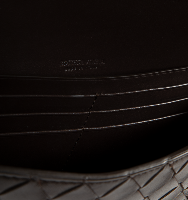 Image 4 of 4 - BLACK - BOTTEGA VENETA Andiamo Clutch featuring top handle, intrecciato leather with signature metallic knot closure, six card slots and one additional pocket. 5.1" x 12.2" x 1.2. Lambskin, calfskin. Made in Italy.