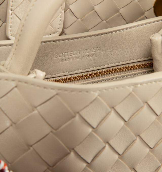 Image 4 of 4 - NEUTRAL - BOTTEGA VENETA Andiamo Bag featuring intrecciato leather, top-handle, multicolor sliding cross-body strap, compartmented interior with one zipped pocket, one open pocket and magnetic closure. Lambskin. Made in Italy.