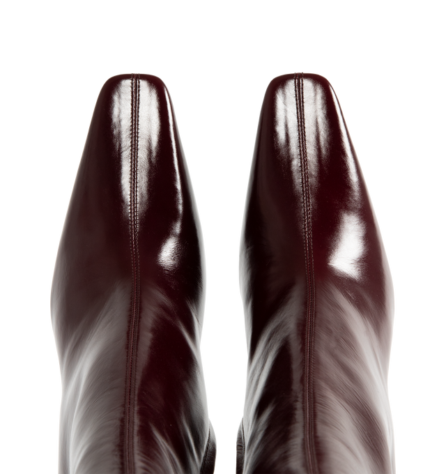 Image 4 of 4 - RED - SAINT LAURENT Jill Booties featuring ankle boots with a square pointed toe and tapered block heel with inner cassandre, a side zip closure and leather sole. 3.7 inch heel. Calfskin. Made in Italy.