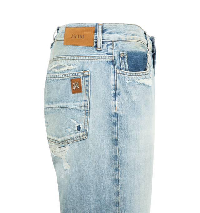 Image 3 of 3 - BLUE - AMIRI Bootcut Jeans featuring heavy distressing, regular fit, five-pocket style, bootcut legs, button and zip fly and belt loops. Cotton. Made in Italy.