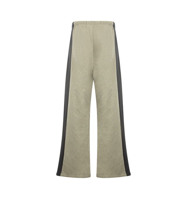 Image 2 of 3 - NEUTRAL - Fear of God Essentials Mens Lounge Pants are crafted from heavyweight 380 GSM cotton-blend core fleece. Feature a wide-leg fit, paneled construction, elasticized waistband with bungee drawcord, side-seam pockets, and an Essentials logo label. Main Material: 80% Cotton, 20% Polyester.