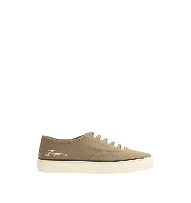 Image 1 of 5 - BROWN - JACQUEMUS The Ff Skate Sneakers featuring canvas upper, round toe, flat cotton laces, embroidered signature and monogram logos, rubber sole and canvas insole and lining. 100% cotton. Made in Portugal.