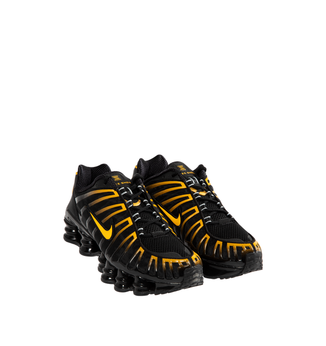 Image 2 of 5 - BLACK - NIKE Shox TL Sneaker featuring Nike Shox technology, a combination upper with a full TPU cage, molded overlays throughout the midfoot, a TPU plate in the heel between the midsole and Nike Shox technology, foam midsole for lightweight cushioning, non-marking, solid rubber in a modified waffle outsole and synthetic and textile upper.