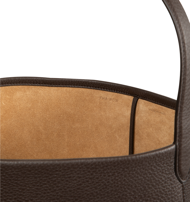 Image 3 of 3 - BROWN - THE ROW Large N/S Park Tote Bag featuring grained calfskin leather, interior toggle closure and flat handle. 15 x 17 x 8 in. 100% leather. Made in Italy.