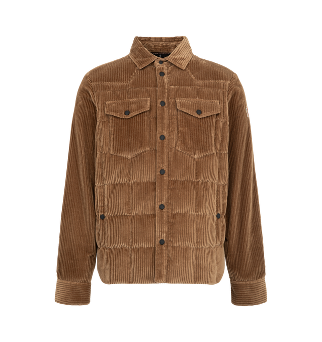 Image 1 of 1 - BROWN - Moncler Grenoble Men's Gelt Down Shirt Jacket is crafted from stretch corduroy and features a shirt jacket silhouette, a classic collar, down-filled insulation, and a snap-button front closure. Designed to blend tailored style with outdoor functionality, this versatile layer is finished with a micro ripstop lining, snap-button flap pockets, and adjustable cuffs for enhanced comfort during trekking, hiking, and everyday wear. Main Material: 98% Cotton, 2% Elastane. Lining: 100% Polyest