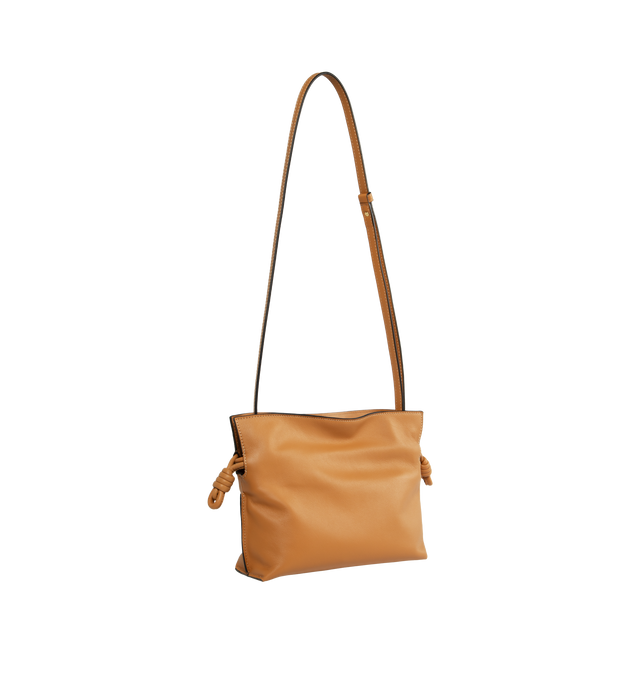 Image 2 of 3 - BROWN - LOEWE Flamenco Mini Napa Drawstring Clutch Bag featuring suede lining, coiled knot drawstring and hidden magnetic closure. 7"H x 9.4"W x 3.5"D. Convertible shoulder strap: 11 1/2" 23 1/2" drop. Nappa calf. Made in Spain.
