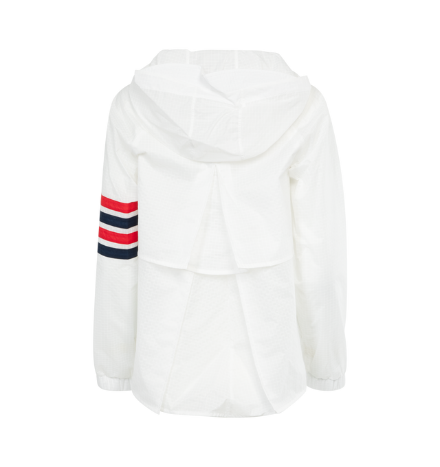 Image 2 of 3 - WHITE - THOM BROWNE Swing Anorak Jacket featuring logo patch to the front, front two-way zip fastening, classic hood, two front patch pockets, signature 4-Bar stripe, long sleeves, ribbed cuffs and straight hem. 100% polyamide.  
