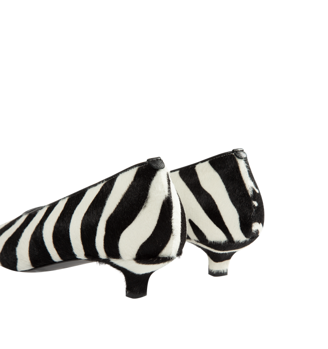 Image 3 of 4 - MULTI - Toteme Women's Zebra Print Pumps are crafted from a printed pony hair-effect calf leather and features a sharp, elongated toe and a low kitten heel. This statement style is finished with a leather lining, insole, and sole. Main Material: 100% Calf Leather. Lining: 100% Sheep Leather. Sole: 100% Cow Leather. Heel Height: 35 mm / 1.4 in. Toe: Elongated Pointed Toe. Color: Tiger. Made in Italy.
