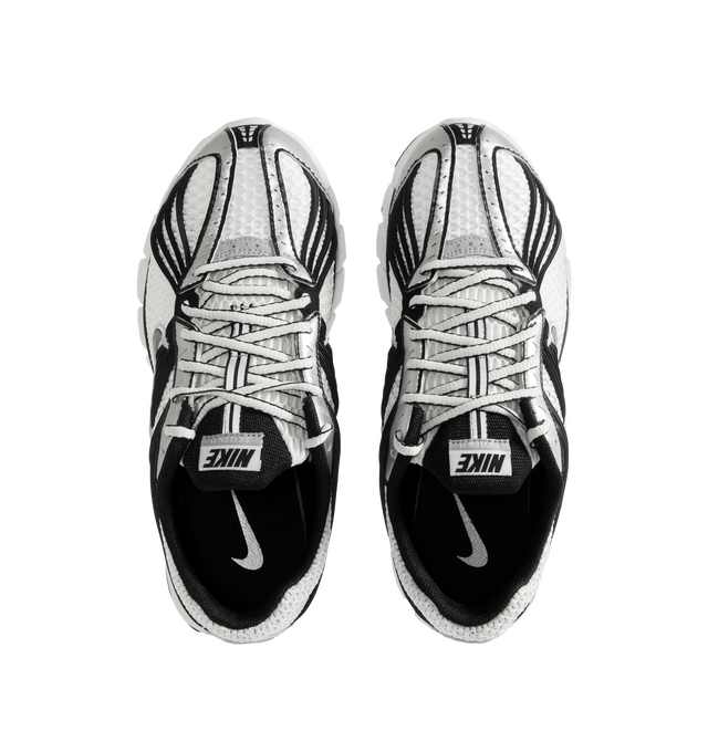 Image 5 of 5 - WHITE - Nike Men's Zoom Skylon 11 Shoes revive the late-2000s performance runner with an aerodynamic silhouette and advanced cushioning technology. Designed for comfort and everyday wear, this retro-inspired style features a chunky Air Zoom midsole with deep flex grooves and exposed cushioning pods that deliver a balanced combination of responsiveness, flexibility, and impact absorption. Materials: Textile & Synthetic upper. Midsole: Air Zoom Cushioning.