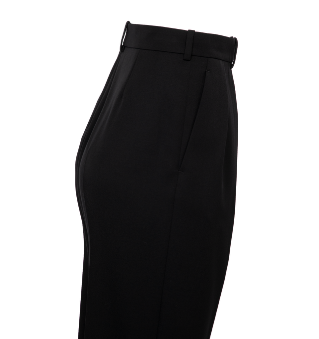 Image 3 of 3 - BLACK - THE ROW Corby Pant featuring tailored relaxed-fit, double front pleat detail, side slash pockets, and lightly tapered ankle. 100% wool. Made in Italy. 
