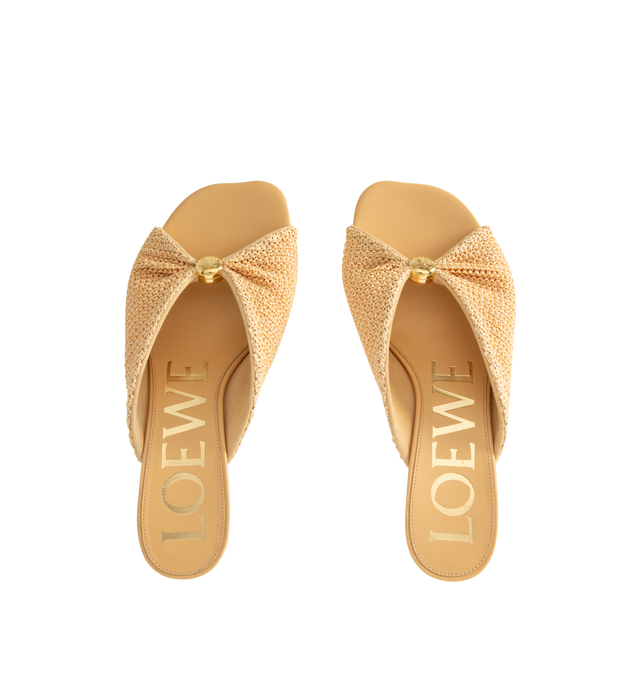 Image 5 of 5 - NEUTRAL - LOEWE PAULA'S IBIZA Pebble Soft slide in raffia-effect fabric featuring a raffia-effect upper, a metallic pebble with an Anagram engraved detail, petal toe shape, 45mm heel, engraved Anagram on pebble, padded leather insole and anagram embossed rubber outsole. Polyester effect raffia. Made in Italy.