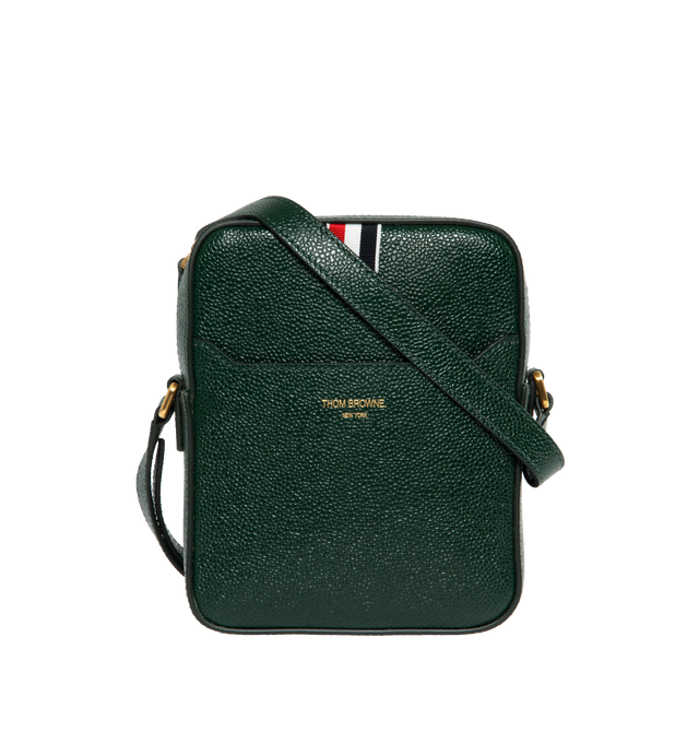 Image 1 of 3 - GREEN - THOM BROWNE Pebble Grain Leather Vertical Camera Bag featuring zippered top closure with leather pull, adjustable shoulder strap, exterior slip pocket. Striped lining with interior slip pocket. Brass hardware. Gold foil printed logo and signature striped grosgrain loop tab at exterior pocket. 100% calf full grain leather. Lining: 100% PL. Made in Italy. 