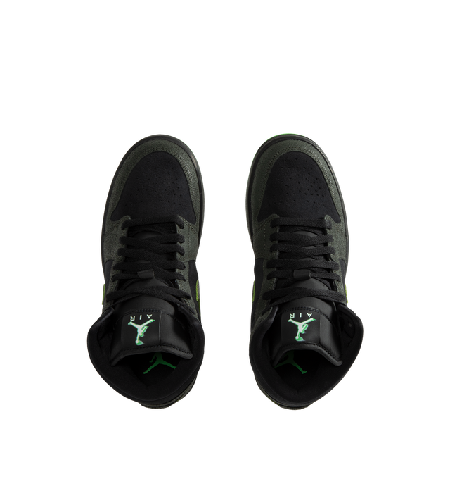 Image 5 of 5 - BLACK - Air Jordan 1 Mid SE Men's Shoes are crafted from premium leather and feature the iconic mid-top silhouette inspired by the original Air Jordan 1. Designed with Nike Air cushioning and a durable rubber outsole, this special edition style delivers everyday comfort while maintaining the classic look that made the AJ1 a legend. Signature details include the Wings logo at the collar, a stitched Swoosh logo, and Jumpman branding at the tongue. Main Material: Leather Upper. Cushioning: Nike