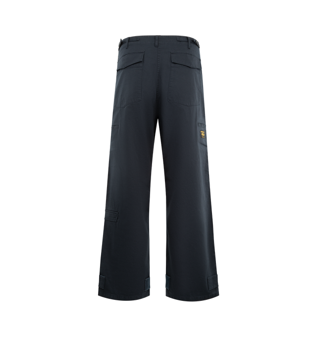 Image 2 of 3 - NAVY - HUMAN MADE Wide Military Pants featuring wide fit, adjustable waist tab, front zip closure, front and back flap pockets with snap button, iPhone size utility pockets on legs, multi-pockets on the front and back and adjustable tape at the hem. 100% cotton.