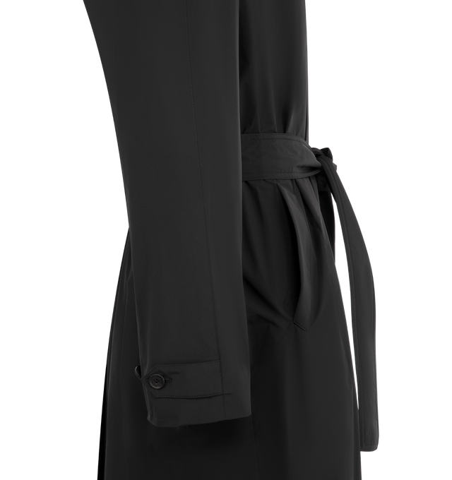 Image 3 of 3 - BLACK - The Row Single-breasted trench coat in water-repellant technical fabric with removable belt, slant welt pockets, and concealed front placket with button closure. 100% Polyester. Made in Italy.