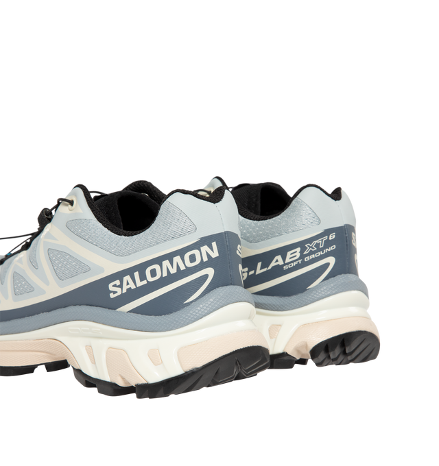 Image 3 of 5 - BLUE - Salomon Men's XT-6 Pearl Blue Sneakers are crafted with a lightweight textile and synthetic upper and feature the brand's Agile Chassis System, Quicklace technology, and advanced cushioning for exceptional stability and comfort. Originally developed for ultra-distance trail running, these designer sneakers combine technical performance with a distinctive Pearl Blue colorway, delivering superior support, durability, and all-terrain traction for both outdoor adventures and everyday wear.