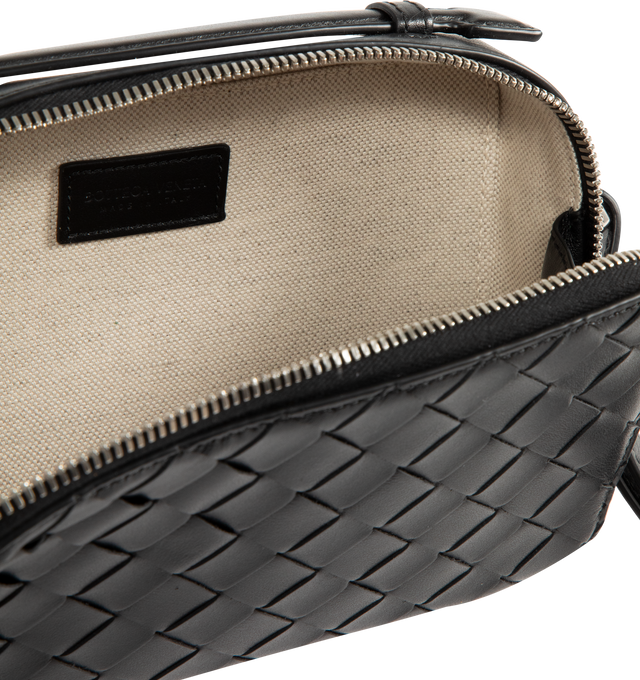 Image 3 of 3 - BLACK - BOTTEGA VENETA Crossbody Bag featuring Intrecciato leather, single compartment, zip closure, silver hardware and crossbody strap. Calfskin. Made in Italy.