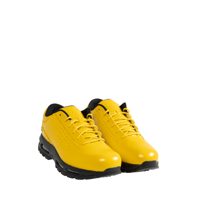 Image 2 of 5 - YELLOW - Nike Air Max Goadome Low Croc Sneakers are crafted from premium leather upper, a padded collar, perforated accents, debossed branding at the tongue, and an embossed Swoosh at the ankle. Finished with visible Nike Air cushioning and a lugged rubber outsole for enhanced traction, the Air Max Goadome Low blends trail-ready durability with everyday wearability. Main Material: Leather Upper. Cushioning: Nike Air with Visible Air Unit. Outsole: Lugged Rubber.