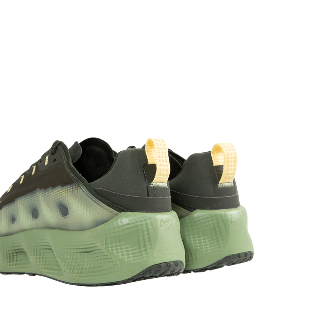 Image 3 of 5 - GREEN - NIKE Ava Rover Sneaker featuring a stacked ReactX midsole, ultralight outsole, breathable upper, mudguards wrap around the lightweight upper to help you feel locked in, perforations on the top of the shoe enhance breathability, oversized midsole made with performance-level ReactX foam for ultra-comfortable cushioning, a thin layer of rubber on the outsole and reflective finish.