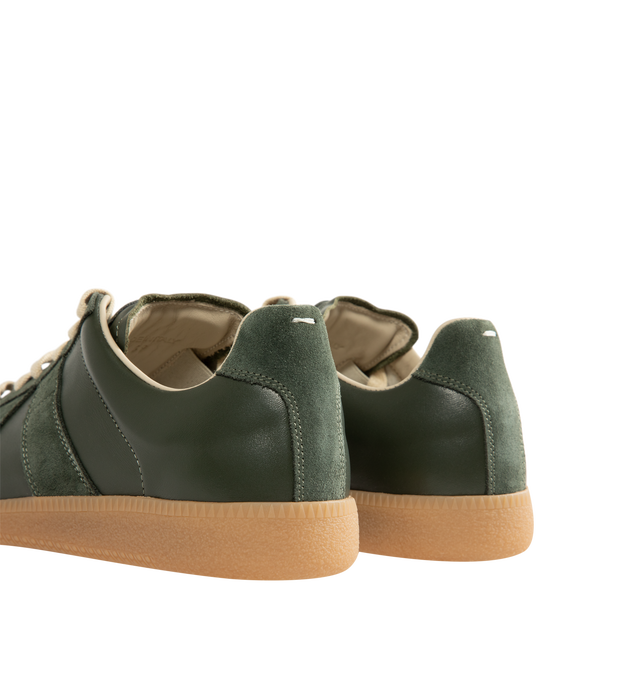 Image 3 of 5 - GREEN - Maison Margiela Men's Replica Sneakers featuring lace-up sneakers in buffed nappa calfskin and calfskin suede, contrasting sole, Maison Margiela logo label on the tab, internal Replica label, internal elastic and all-over Maison Margiela logo insole. 100% calf leather. Sole: 100% rubber. Made in Italy.