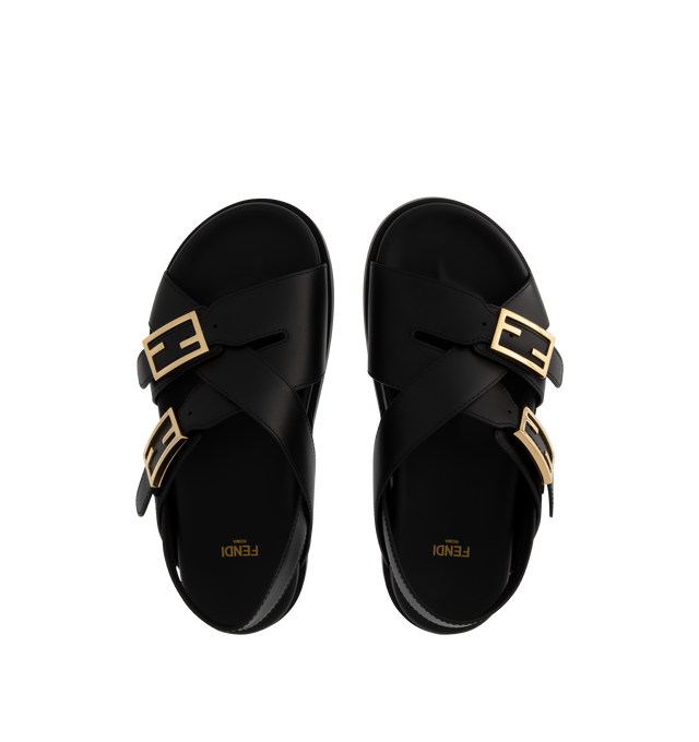 Image 4 of 4 - BLACK - FENDI Feel Sandal featuring triple-band, flat cross-over slides with FF Baguette decorative buckles, elastic detail on the back strap and gold-finish metalware. 100% calf leather. Made in Italy.