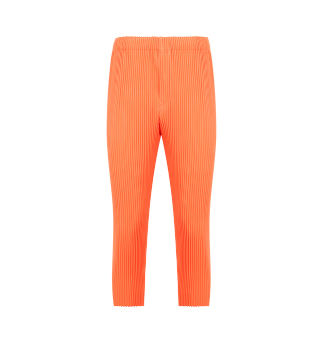 Image 1 of 3 - ORANGE - ISSEY MIYAKE Pant featuring portability and lightweight comfort, quick-drying properties, shorter length, pockets on both sides, a drawstring waist and button-fly design. 100% polyester. Made in Japan.