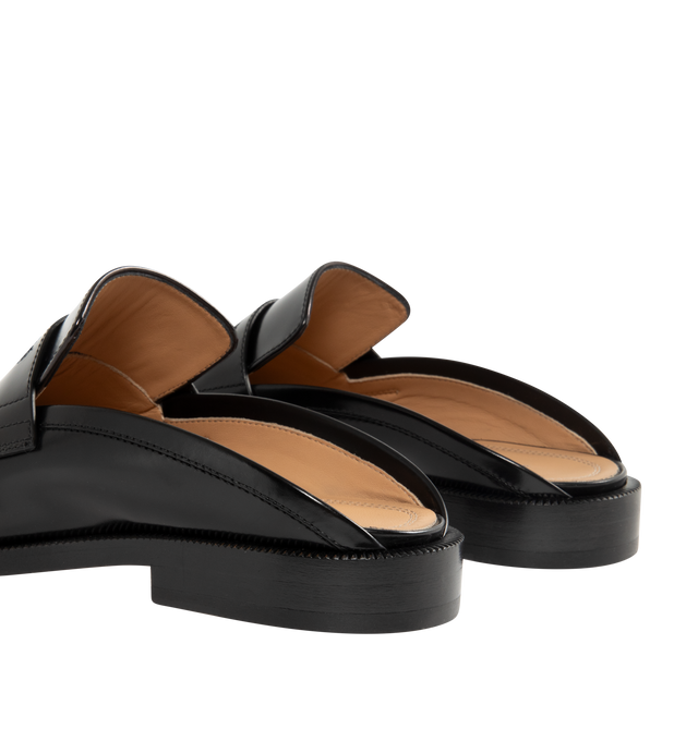 Image 3 of 4 - BLACK - MAISON MARGIELA Tabi City Loafer Mules featuring polished calfskin, slip-on, square cleft toe, strap with cutout at vamp, logo stamp at padded footbed, buffed lambskin lining, serrated edge at welt, stacked leather heel with rubber injection and leather sole. Upper: calfskin. Sole: leather, rubber. Made in Italy.