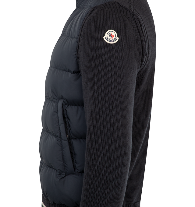 Image 3 of 3 - NAVY - MONCLER Padded Cardigan featuring cotton corduroy and lightweight micro chic, down-filled and padded, stockinette stitch, zip closure, pockets with snap button closure, striped trim and logo. 100% polyester. 100% cotton. Padding: 90% down, 10% feather.