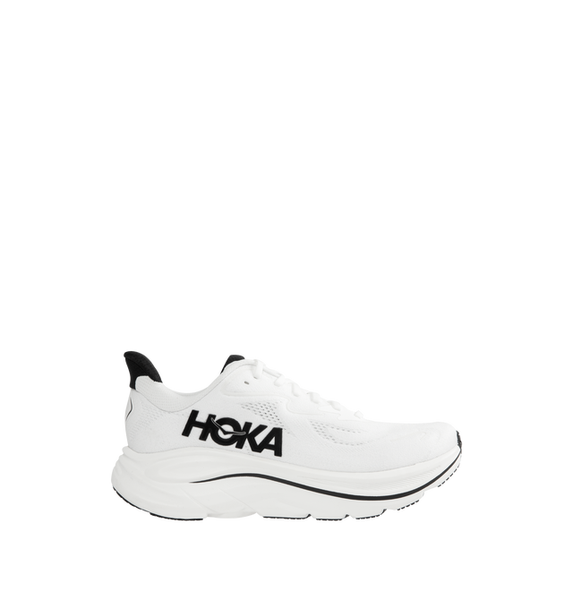 Image 1 of 5 - WHITE - HOKA Clifton 10 Sneaker featuring jacquard knit, reflective upper details, smooth MetaRocker, rearfoot-focused Active Foot Frame, CMEVA midsole, molded EVA sockliner and inherently durable abrasion rubber.