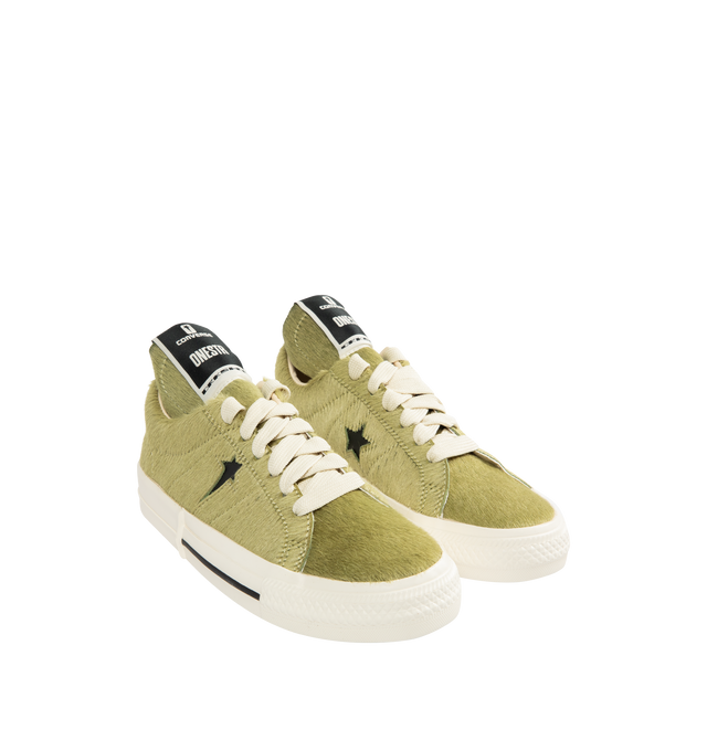 Image 2 of 5 - GREEN - DRKSHDW X CONVERSE Calf Hair Low-Top Sneakers featuring an extra-textured hair-on-hide leather upper with exaggerated width proportions, flat heel, round toe, lace-up vamp, signature DRKSHDW elongated tongue with woven label, custom DRKSHDW Star logo on the side, skateboard One-Star Converse sole, DRKSHDW license plate with pentagram collab logo on the left heel, Converse All-Star logo on the right heel and CX foam cushioned internal midsole.