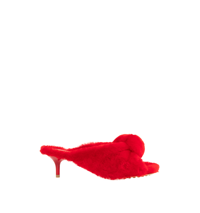 Image 1 of 5 - RED - BOTTEGA VENETA Cherry Mule featuring kitten heel mule sandal in soft merino shearling and a cushioned signature knot detail. Merino shearling. Lining: lambskin. Rubber-injected leather outsole. Made in Italy.