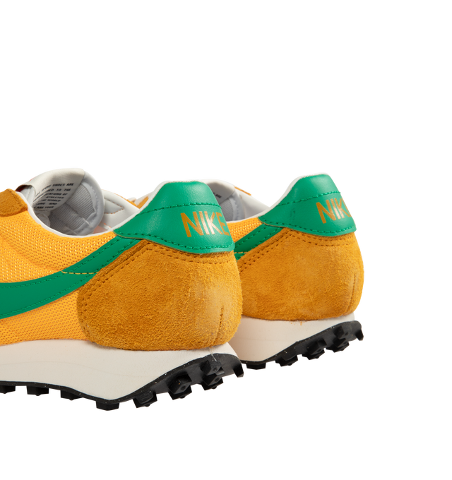 Image 3 of 5 - ORANGE - NIKE LD-1000 Sneaker featuring an upper that combines leather and textiles for a durable, breathable fit, waffle outsole provides durable traction, foam midsole and rubber outsole.