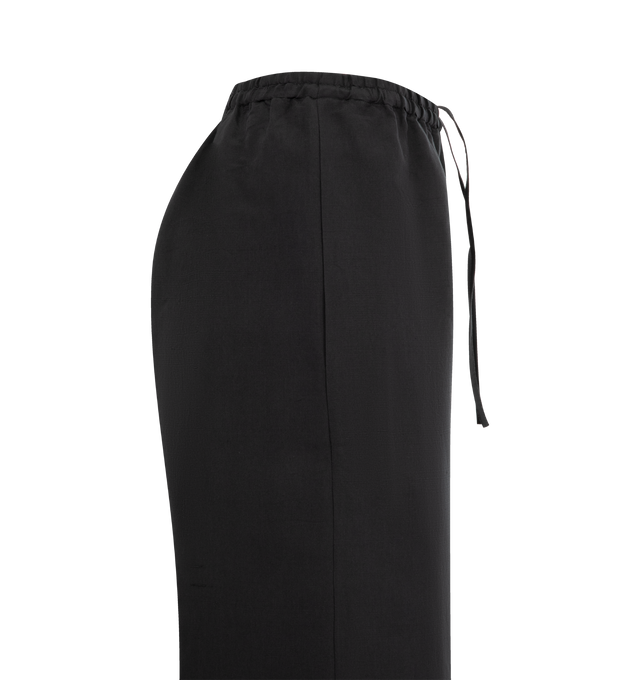 Image 3 of 3 - BLACK - THE ROW Bellana Pant featuring mid-rise pull-on pant in natural silk shantung with wide leg, gathered elastic waistband and side seam pockets. 100% silk. Made in Italy.