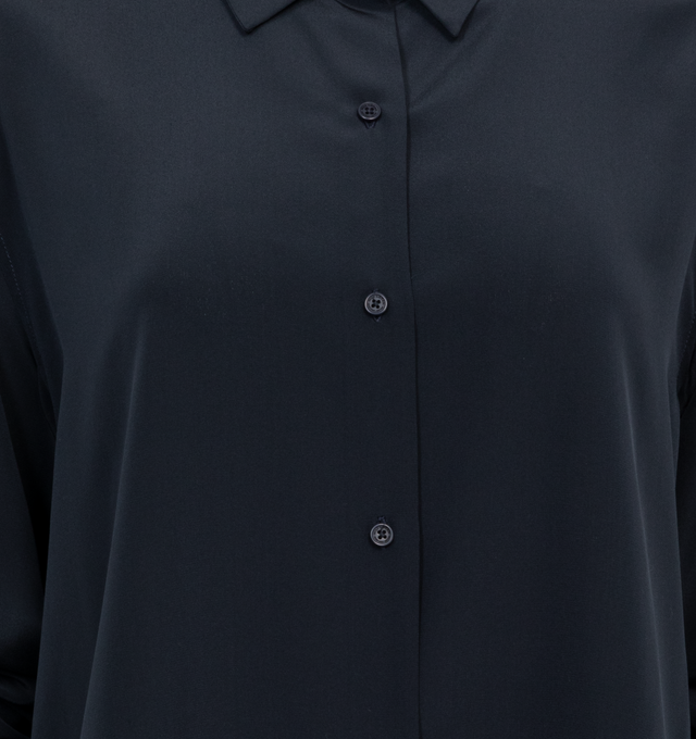 Image 3 of 3 - BLUE - NILI LOTAN Julien Shirt featuring an oversized fit, long-sleeves, button front, dropped shoulder, spread collar, shirred back yoke, curved shirttail hem and tonal buttons. 100% silk. 