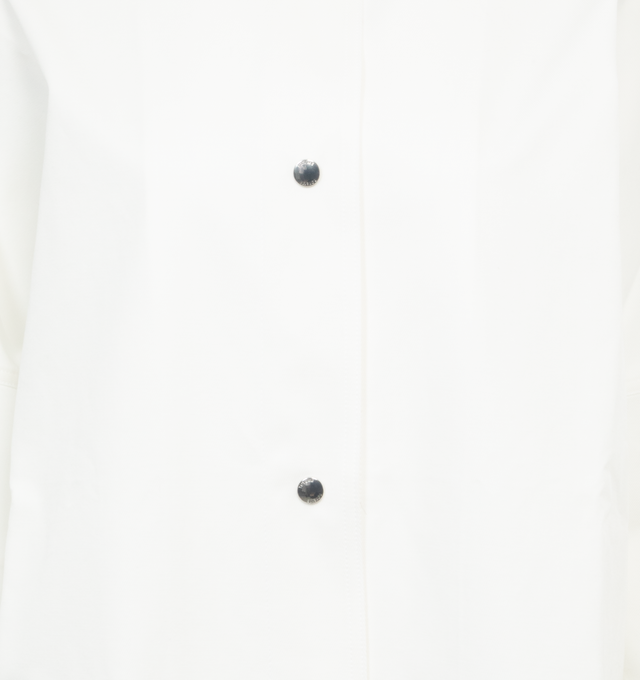 Image 3 of 3 - WHITE - TOTEME Cotton Twill Overshirt Jacket featuring oversized shape with dropped shoulders, silver-tone press buttons and flap pockets. 100% organic cotton. 