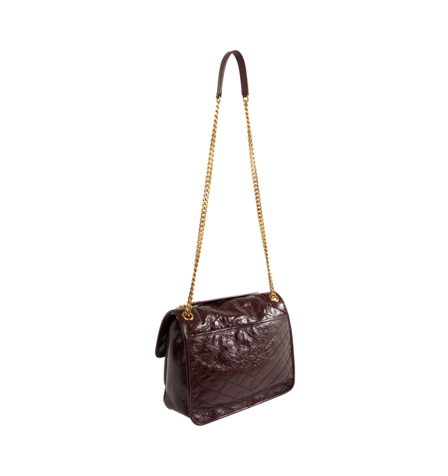 Image 3 of 4 - RED - NIKI Medium Bag in vintage leather featuring chevron-quilted topstitching, sliding leather-and-chain strap allows for both shoulder and crossbody carry, chrome-free, metal-free tanned leather, certified cotton lining, bronze-tone hardware, magnetic snap closure, one back pocket and one open pocket under flap. 11" x 7.9" x 3.3". Calfskin leather. Made in Italy.