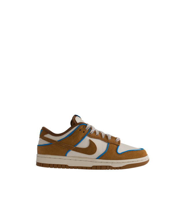 Image 1 of 5 - BROWN - NIKE Dunk Low Retro Premium in "British Tan" featuring padded, low-cut collar, aged upper, foam midsole and rubber outsole with classic hoops pivot circle. 