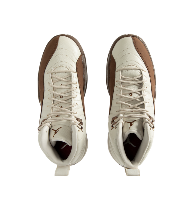 Image 5 of 5 - BROWN - Air Jordan 12 Retro "Fireside" Men's Shoes feature the iconic AJ12 silhouette in a seasonal colorway inspired by cozy autumn evenings. Crafted with a premium leather upper, this heritage basketball style combines Light Orewood Brown and Cacao Wow tones with the signature radial stitch detailing that pays homage to the original design worn by Michael Jordan. Full-length Air Zoom cushioning delivers responsive comfort, while a durable rubber outsole provides reliable traction for ever