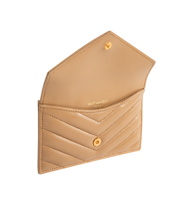 Image 3 of 3 - BROWN - SAINT LAURENT Zip Card Case with flap in soft nappa leather, decorated with the CASSANDRE and chevron-quilted topstitching, leather lining, gold-toned hardware, snap-button closure, one zip coin pocket and five card slots. 5.1" x 3.1" x 0.7". Calfskin leather. Made in Italy.