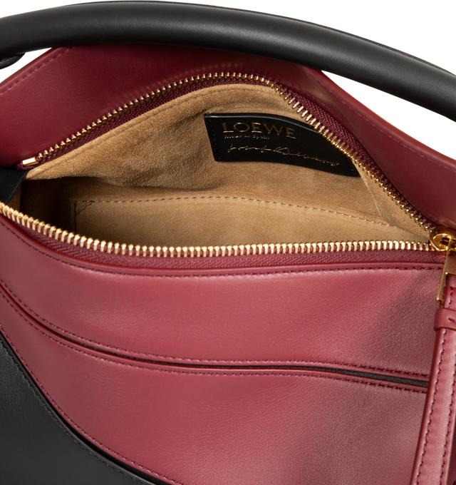 Image 3 of 3 - PURPLE - LOEWE Small Puzzle Bag in classic calfskin and suede featuring distinctive geometric lines and cuboid form. Shoulder, crossbody or hand carry, detachable and adjustable strap, zip closure with calfskin pull, one external zip rear pocket, one internal slip pocket, suede lining and embossed Anagram. Classic Calf/Suede. 16.5 cm x 24 cm x 10.5 cm. Made in Spain.