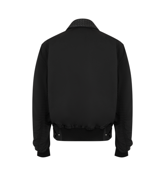Image 2 of 3 - BLACK - Bottega Veneta Mens Bomber Jacket is crafted from polyamide. Features an Intrecciato-inspired woven collar, zip-front closure with snap-button placket, buttoned front pockets, ribbed cuffs and hem, and a regular fit. Main Material: 100% Polyamide. Made in Italy.