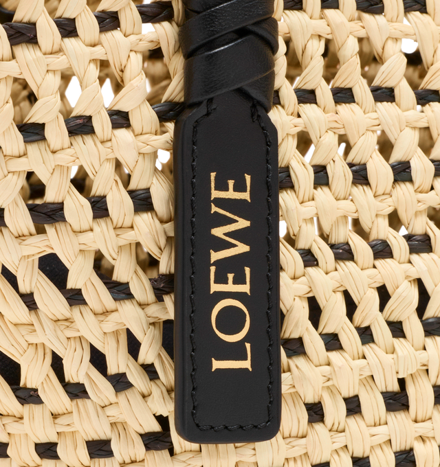 Image 5 of 5 - NEUTRAL - LOEWE PAULA'S IBIZA Small Braid Basket Bag in iraca palm and calfskin featuring shoulder carry, calfskin tie closure, unlined, removable Anagram Pebble dice and gold embossed LOEWE. Iraca palm/calf. 18 cm x 36 cm x 13 cm. Made in Spain.
