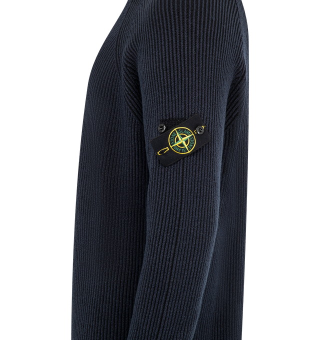 Image 3 of 3 - NAVY - STONE ISLAND Mock Neck Sweater featuring stitching along neckline, raglan sleeves, Stone Island badge on left sleeve, plain hem on cuffs and bottom and loose fit. 57% virgin wool, 35% cotton, 7% polyamide/nylon, 1% elastane/spandex.