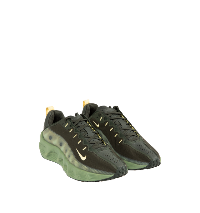 Image 2 of 5 - GREEN - NIKE Ava Rover Sneaker featuring a stacked ReactX midsole, ultralight outsole, breathable upper, mudguards wrap around the lightweight upper to help you feel locked in, perforations on the top of the shoe enhance breathability, oversized midsole made with performance-level ReactX foam for ultra-comfortable cushioning, a thin layer of rubber on the outsole and reflective finish.