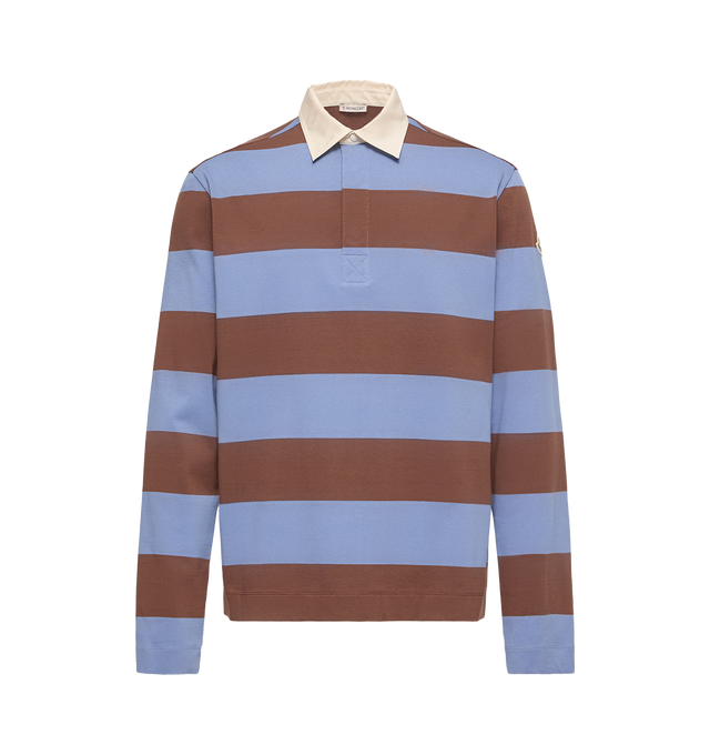 Image 1 of 1 - MULTI - Moncler Mens Striped Cotton Long Sleeve Polo Shirt is crafted from cotton jersey and features a contrasting cotton and polyester gabardine collar, snap button closure, long sleeves, and a signature logo patch. This designer long-sleeve polo shirt combines classic rugby-inspired styling with a relaxed silhouette for elevated everyday wear. Main Material: 100% Cotton; Collar: 70% Cotton, 30% Polyester. Made in Turkey.