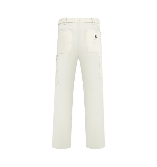 Image 2 of 3 - WHITE - SACAI X CARHARTT Duck Pants featuring a cargo-inspired silhouette with double-knee various patch pockets, a woven belt, side and back patch pockets and zip fly, button closure. 100% cotton. Made in Japan.