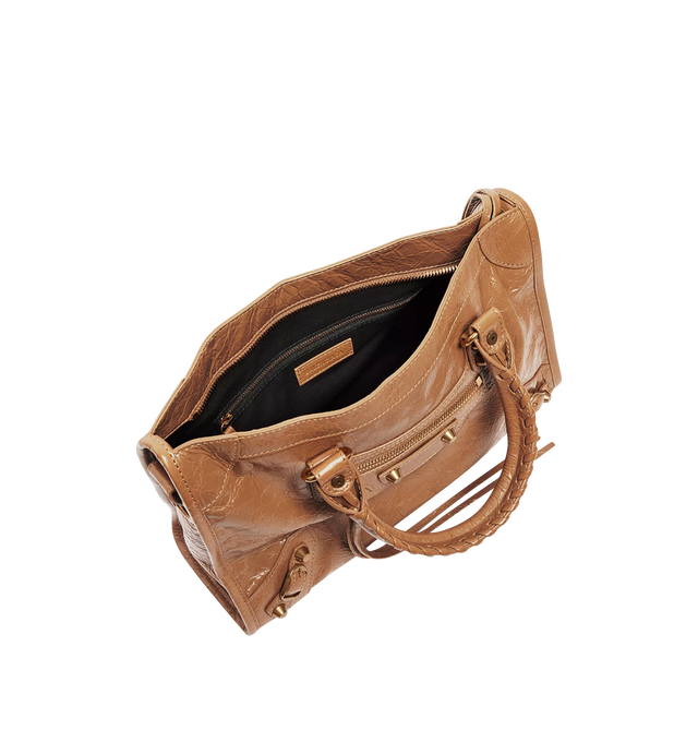 Image 4 of 4 - BROWN - BALENCIAGA Le City Bag Small featuring arena lambskin, two leather hand-braided handles, removable and adjustable shoulder strap, brass hardware, zipped closure with knotted leather puller, front zipped pocket with knotted leather puller, 1 inner zipped pocket and cotton canvas lining. Lambskin. 11.8" x 7.5" x 3.8". Made in Italy.