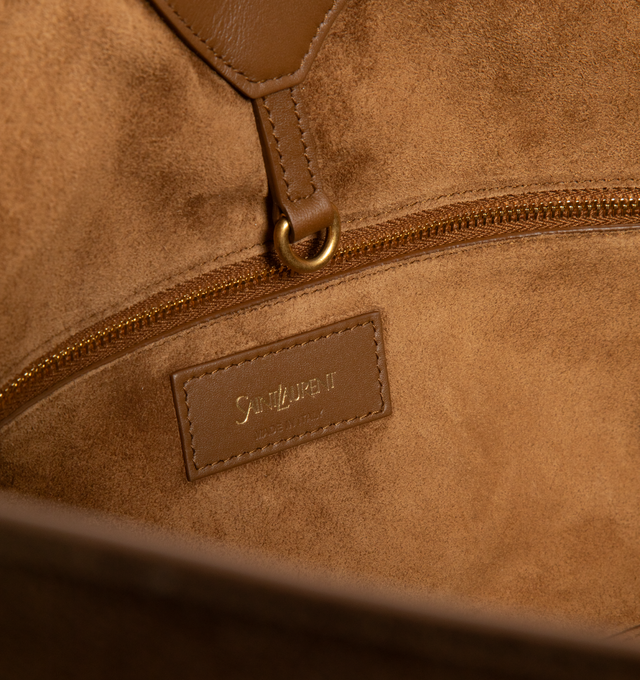 Image 3 of 4 - BROWN - SAINT LAURENT Y Small Tote in suede featuring small version of the Y tote in finely grained leather, ultra-lightweight bag, subtle Y signature stitching, lined in tonal leather, zip pocket, hook closure, one zip pocket and one keyring carabiner tab. 11.4" x 9.4" x 6.5". Calfskin. Made in Italy.